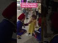 Concerned passengers around the girl